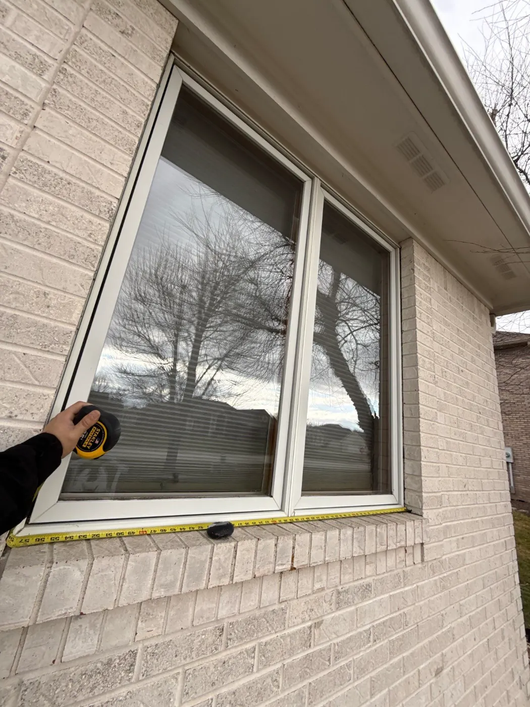 Window replacement documented in Oaklandon